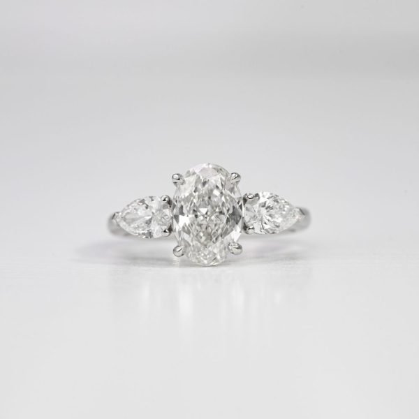 Oval Brilliant & Pear Three-Stone Diamond Ring (2) Oval Brilliant & Pear Three-Stone Diamond Ring (2)